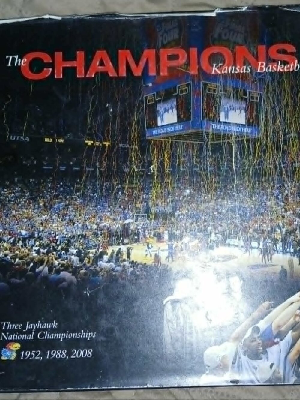 Book titled "The Champions:  Kansas Basketball at the Pinnacle